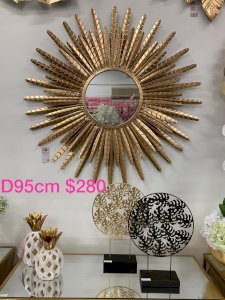 Gold feather wall mirror 